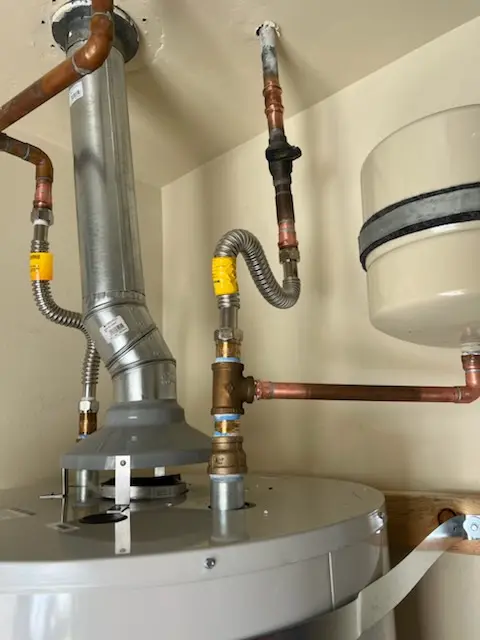 Water heater installation and plumbing repair in Denison